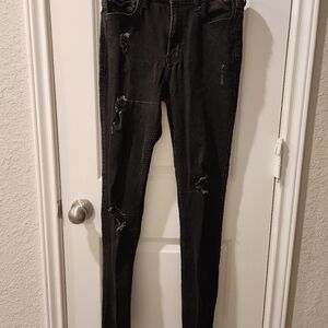 Men's Hollister black high rise super skinny distressed classic stretch jean.